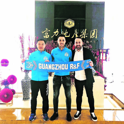 סולומוביץ' יחד עם זהבי ועם יו"ר גוואנגז'ו, בסין | צילום פרטי